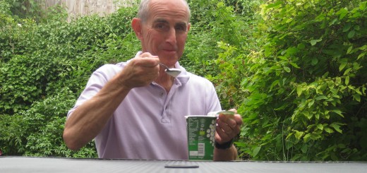 Image of man over 50 eating a yoghurt